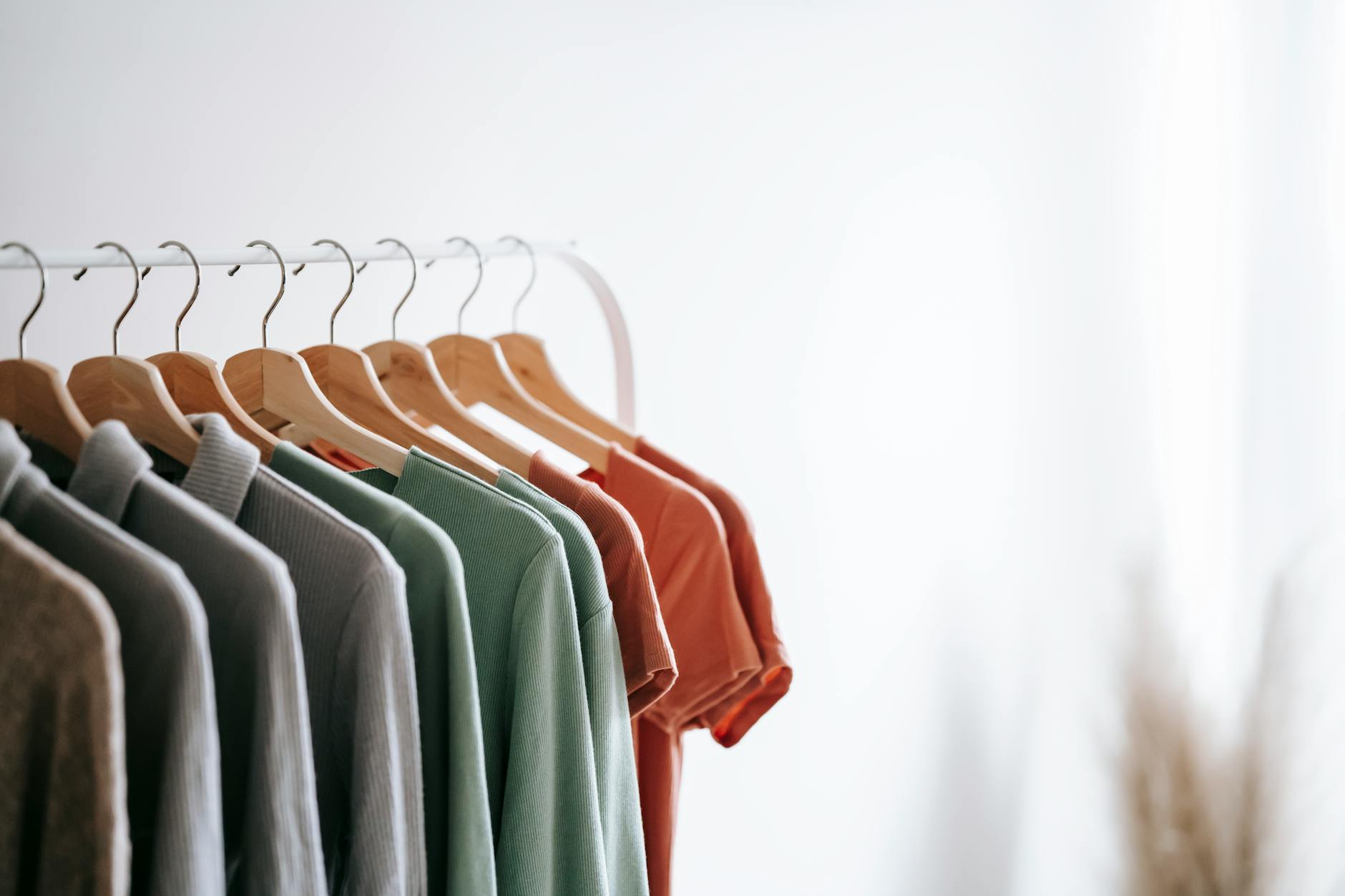 home interior with garments on racks