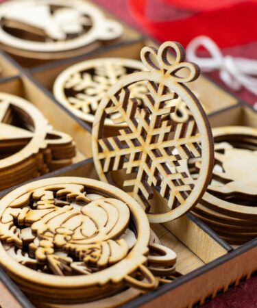 wooden christmas ornaments on a box