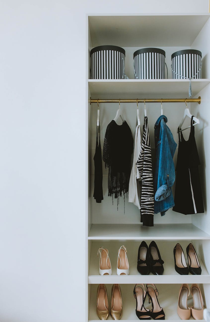 clothes and high heel shoes inside a closet