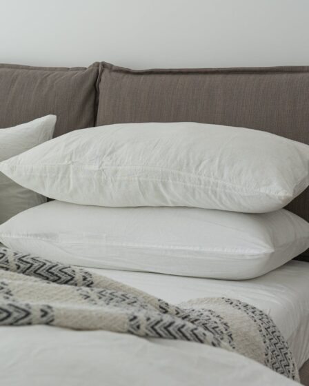 white pillows on a bed