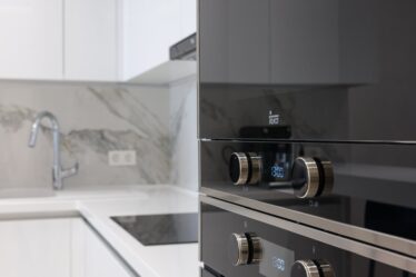 modern kitchen interior with electronic stove