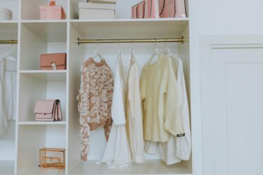 organized white wooden closet
