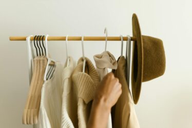 hanging of clothes on a clothing rack