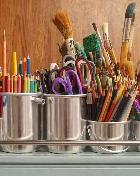 pencils in stainless steel bucket